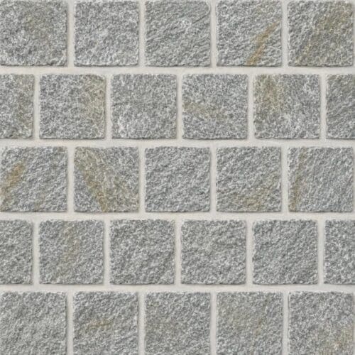 Forest Grey Quartz Cobblestone Pavers showing grey textured cobbles with light mineral markings in offset rows