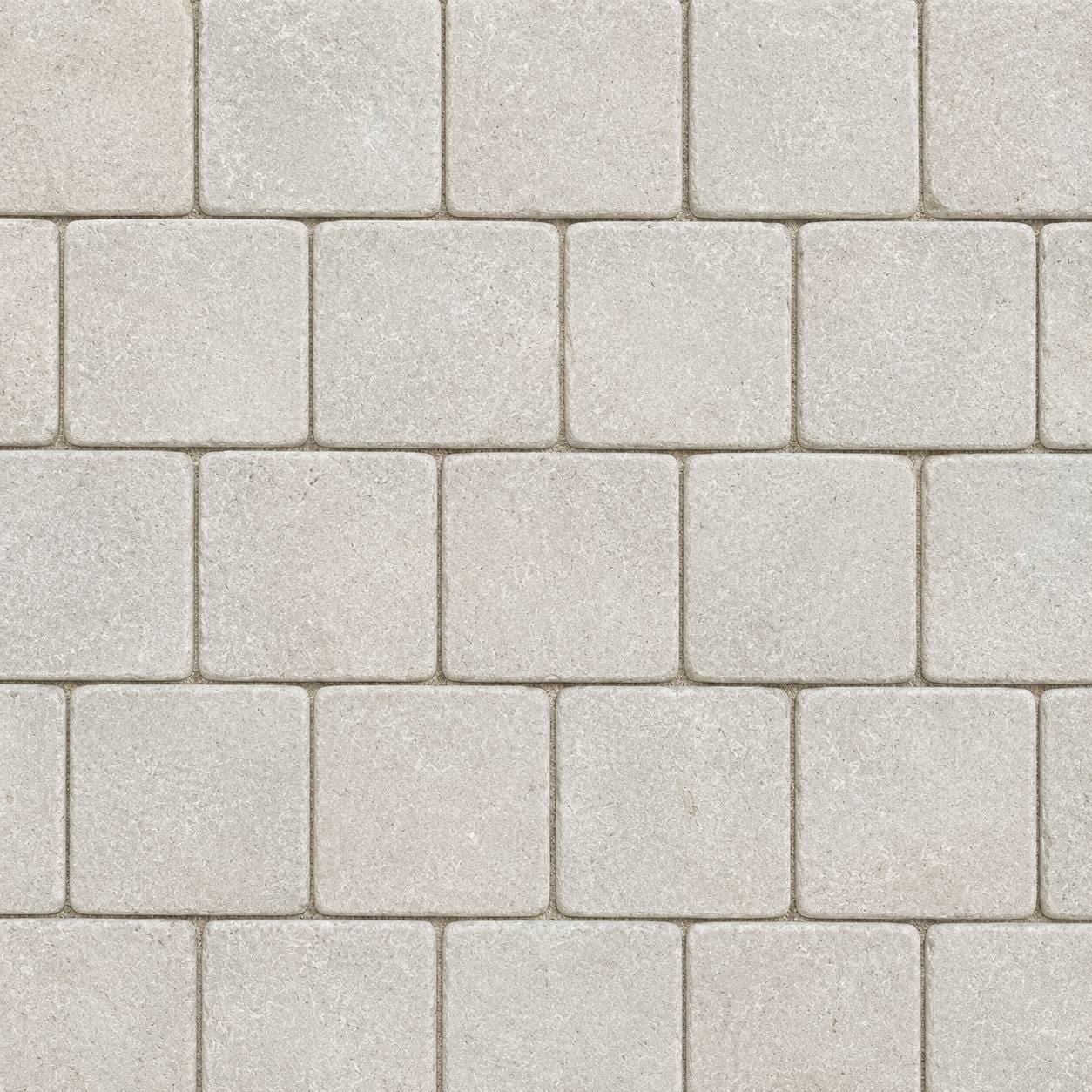 New Jura Beige Limestone Cobblestone Pavers showing pale beige cobbles with rounded edges and fine surface markings